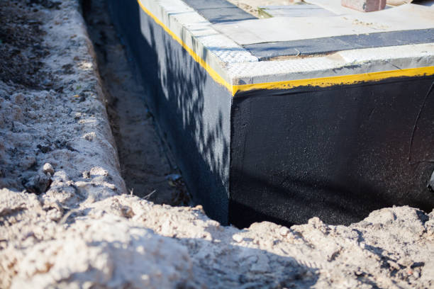 Professional Waterproofing technician working in Waynesboro, TN
